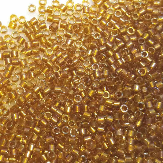 11/0 MIYUKI delica DB0065 - Crystal Topaz AB lined - 1gr.  - Miyukilandia