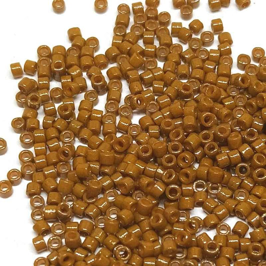 11/0 MIYUKI delica DB2109 - Duracoat Opaque Dyed Sienna - 1gr.  - Miyukilandia