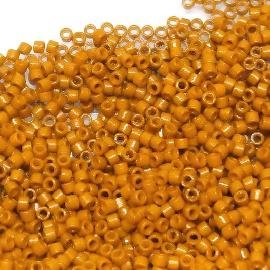 11/0 MIYUKI delica DB2108 - Duracoat Opaque Persimmon - 1gr.  - Miyukilandia