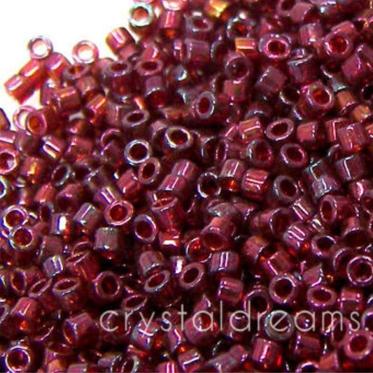 11/0 MIYUKI delica DB0105 - Gold Luster Trasp. Red -1gr.  - Miyukilandia