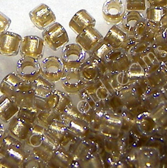 11/0 MIYUKI delica DB0907 - Sparkling Lt Bronze Lined Crystal - 1gr.  - Miyukilandia