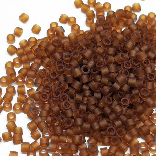 11/0 MIYUKI delica DB0764 - Transparent Mate Smoked Topaz  1 gr.  - Miyukilandia