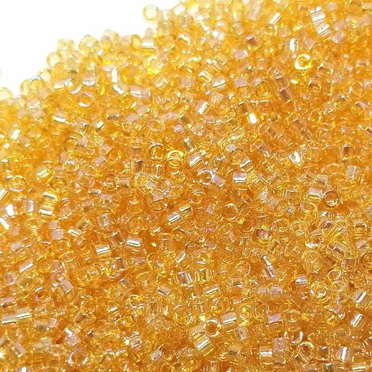 11/0 MIYUKI delica DB0100 - Trasp. Light Amber AB  1gr.  - Miyukilandia