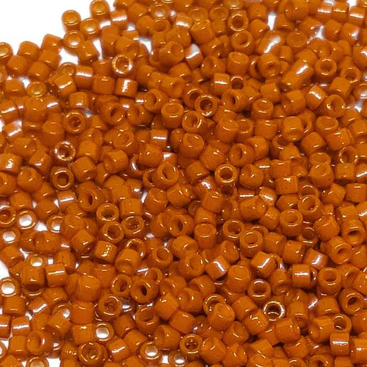 11/0 MIYUKI delica DB2352 Duracoat Opaque Orange Rust - 1gr.  - Miyukilandia