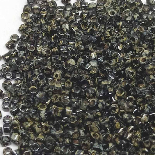 11/0 MIYUKI delica DB2261 Opaque Picasso Black - 1gr.  - Miyukilandia