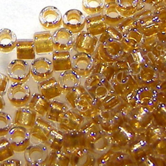 11/0 MIYUKI delica DB0901 Spark Gold Lined Crystal 1gr.  - Miyukilandia