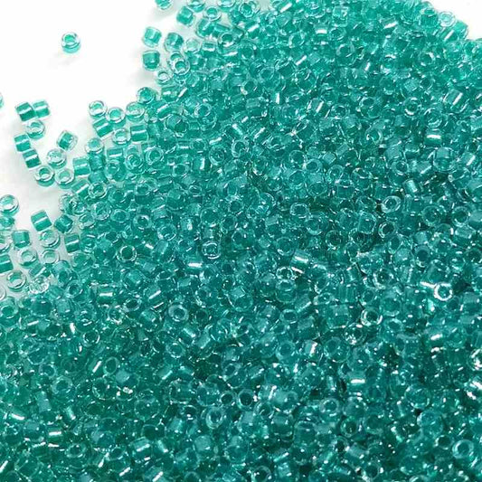 11/0 MIYUKI delica DB0904 Sparkling Turquoise Lined Crystal 1gr.  - Miyukilandia