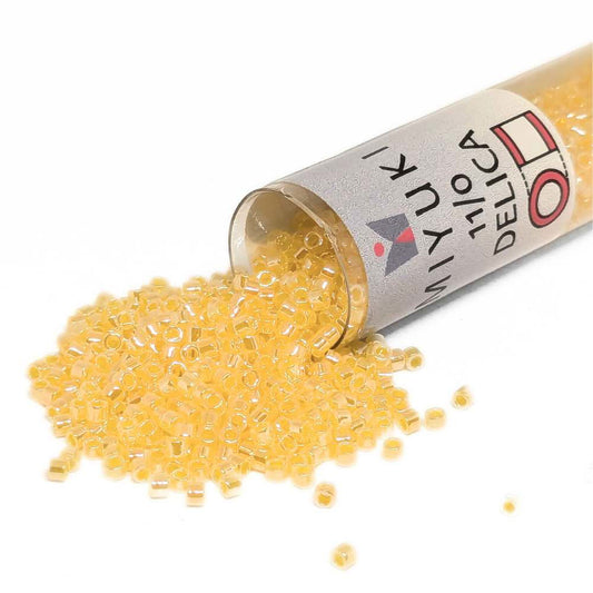 DB0233 Tubo Miyuki Delica 11/0 Lined Crystal Yellow Luster 7,2gr  - Miyukilandia