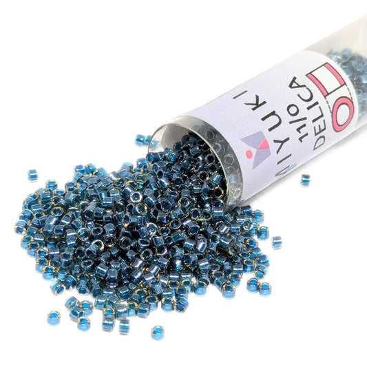 DB0921 Tubo Miyuki Delica 11/0 Sparkling Teal Lined Topaz 7,2gr.  - Miyukilandia