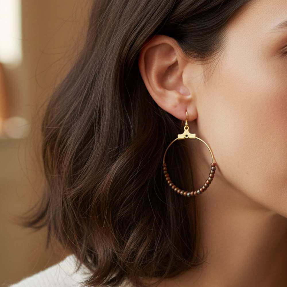 Pieza de joyería circular de acero inoxidable con baño de oro 18K